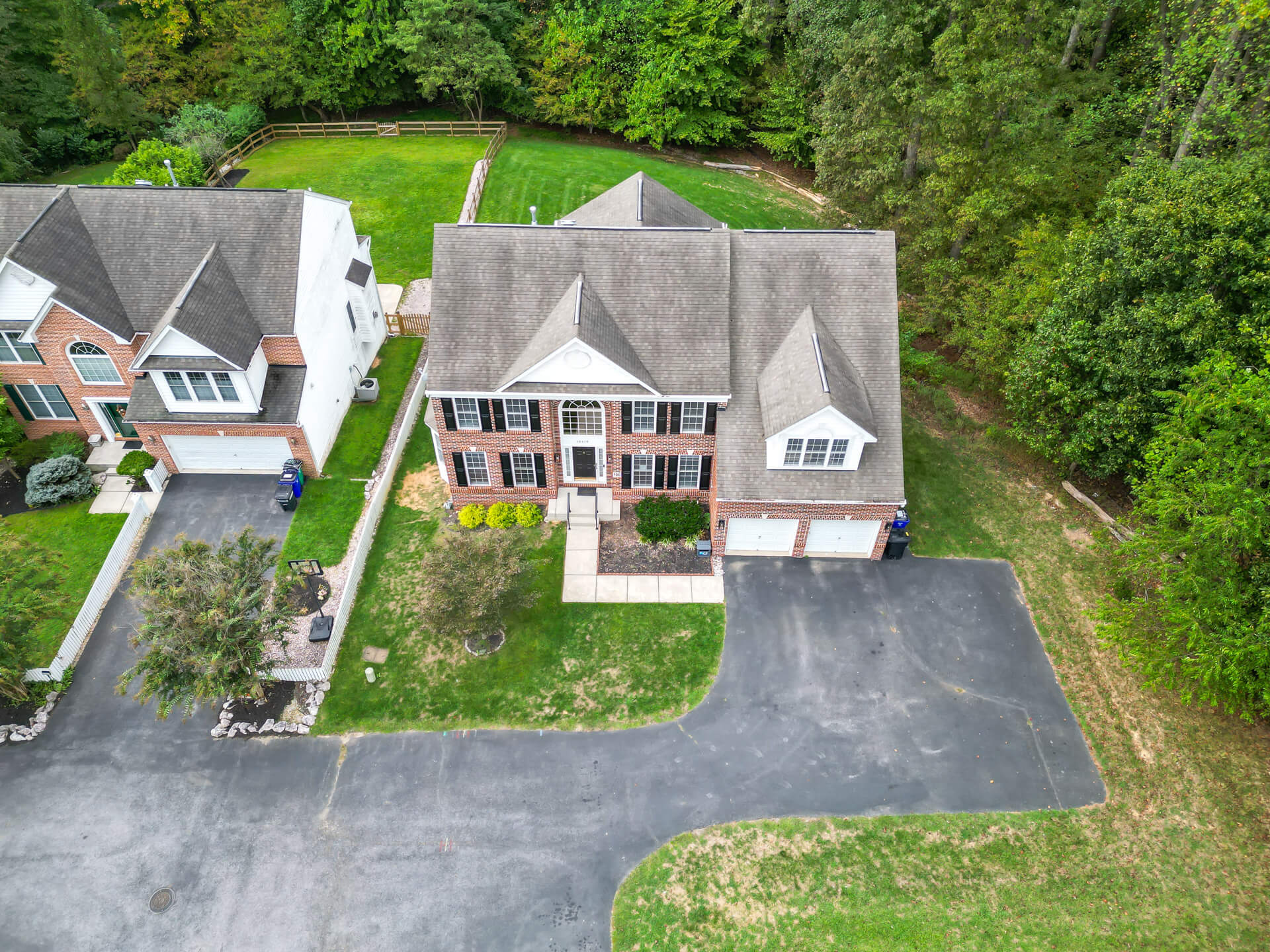 Large front lawn providing a beautiful first impression for families and guests.