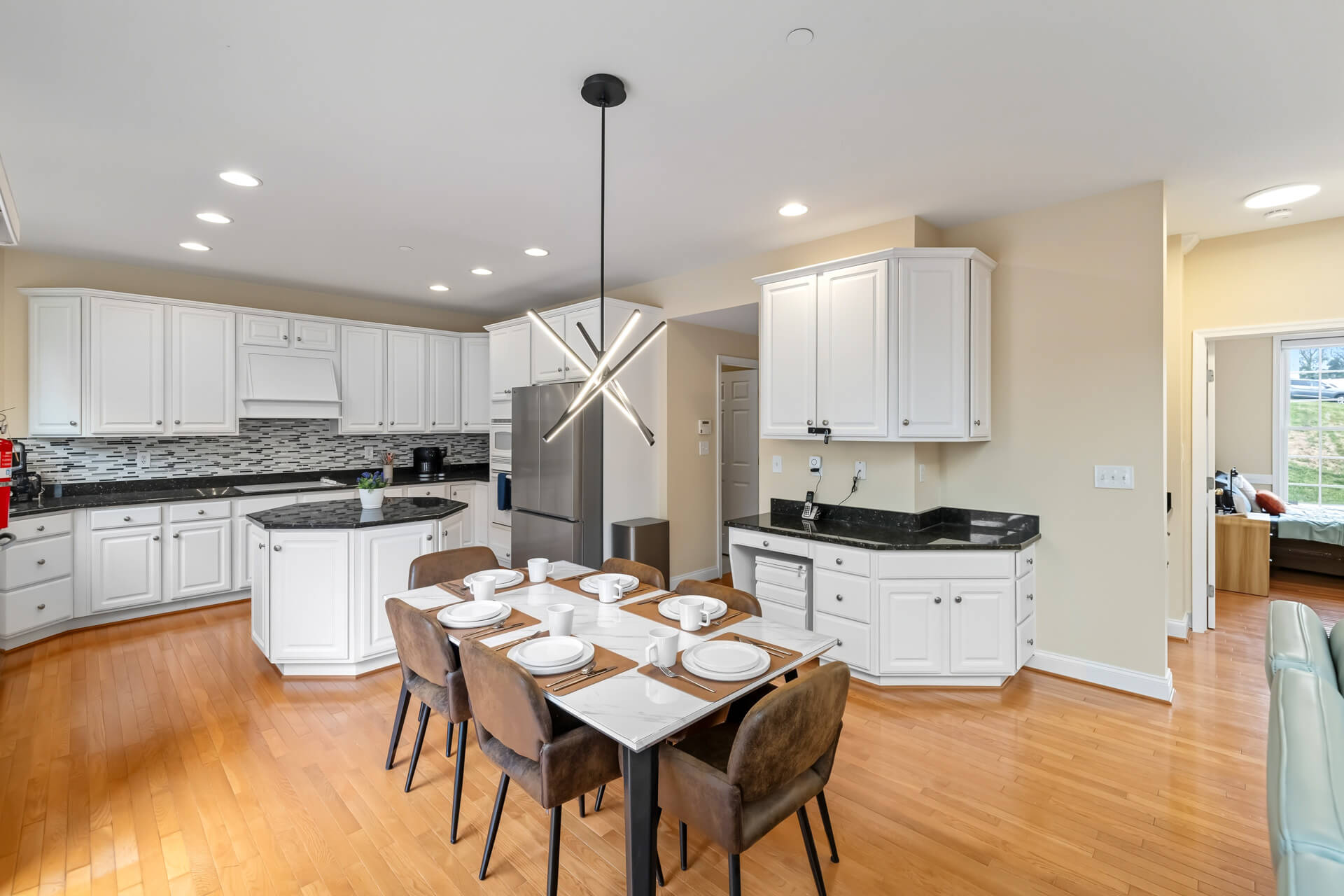 Bright residential-style dining room set for a communal meal