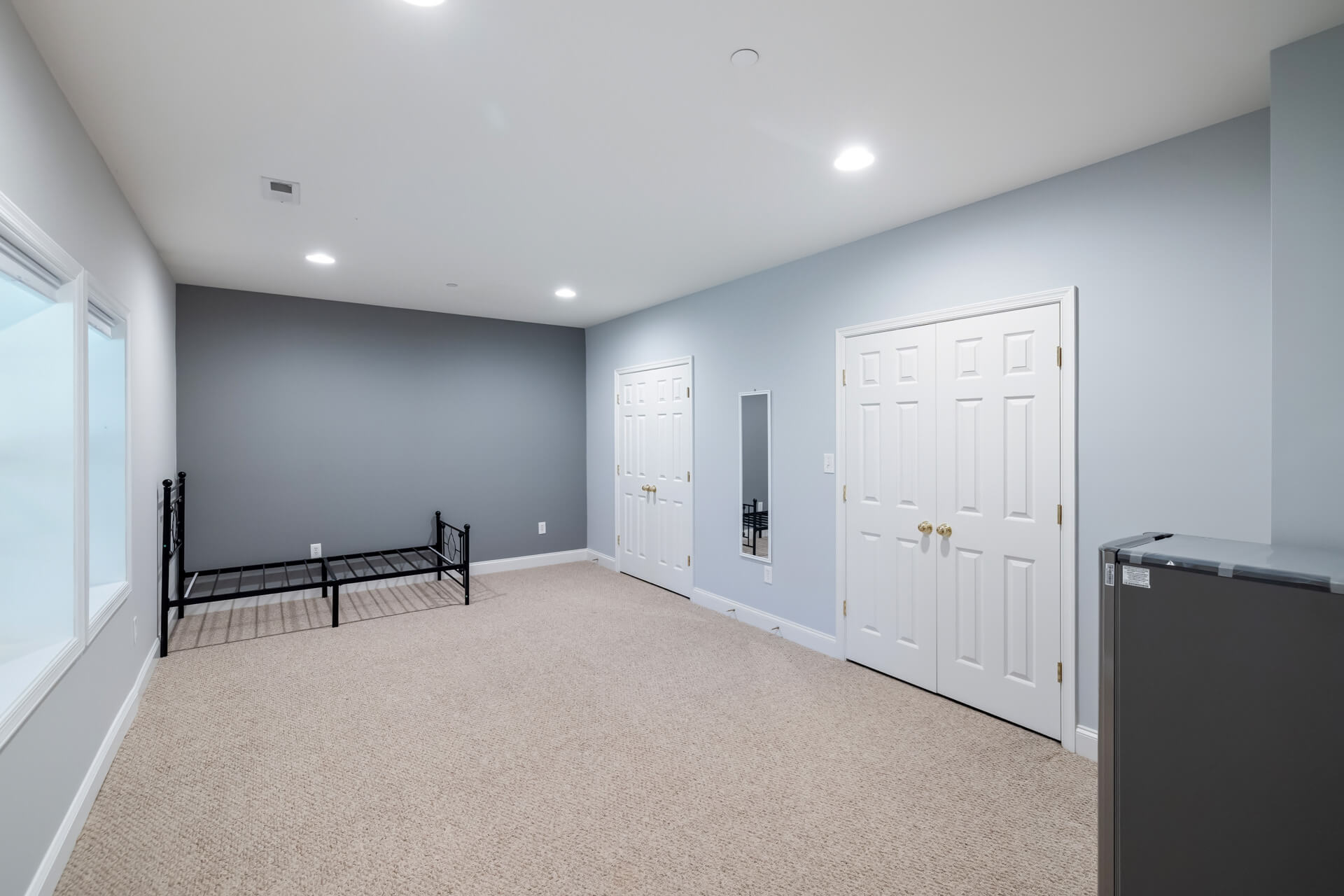 Multi-use activity room with movable seating and storage